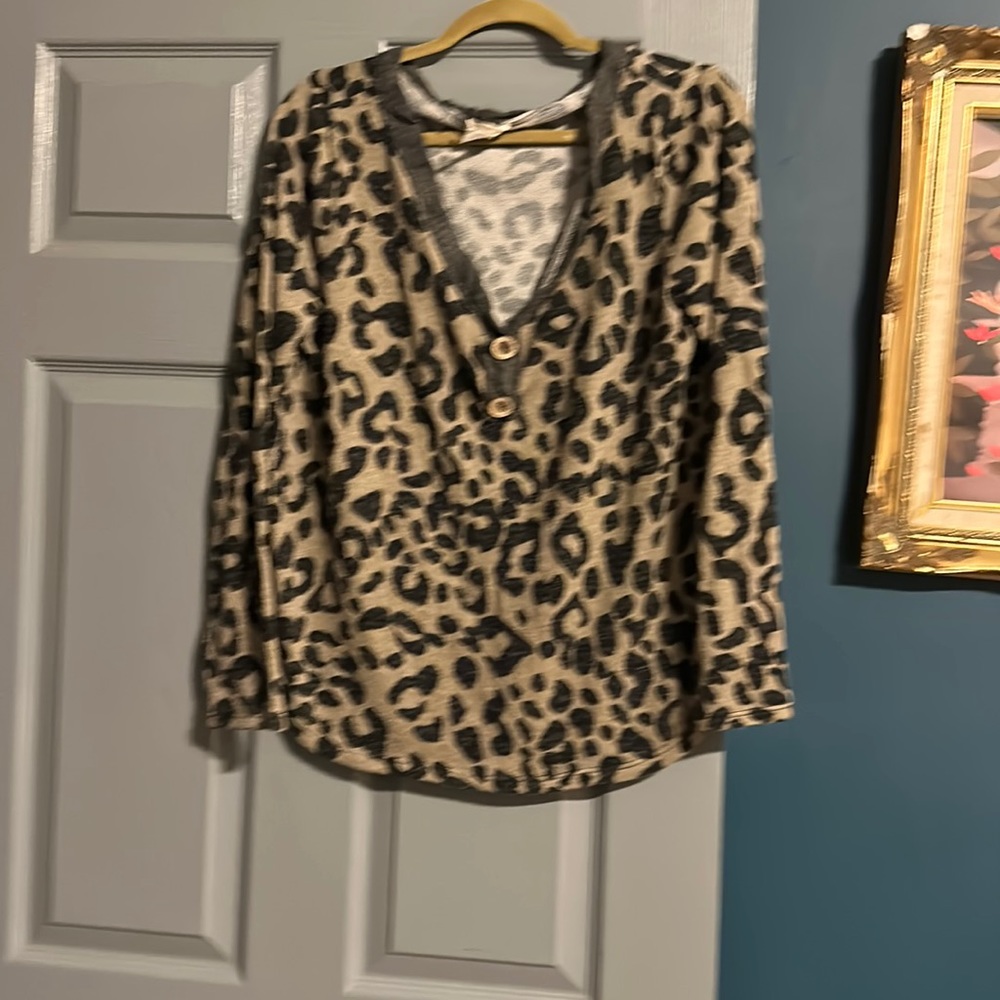 Cheetah print vneck sweater by Bibi with buttons. Large